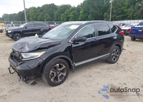 2018 Honda Cr-V Touring z USA, uszkodzony, nr VIN 7FARW1H95JE054478